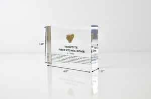 Trinitite specimen with dimension measurements shown on white background, collector gift
