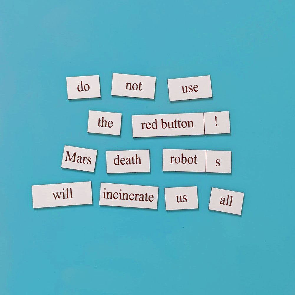 white engineer word magnet tiles on light blue background