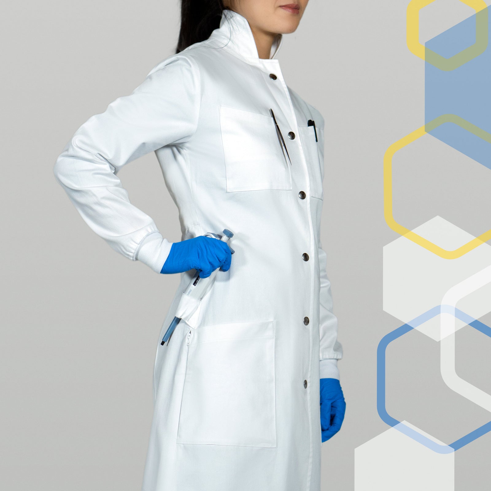 Chemistry or microbiology lab coat for women in science with pipette holster on hip like a utility loop
