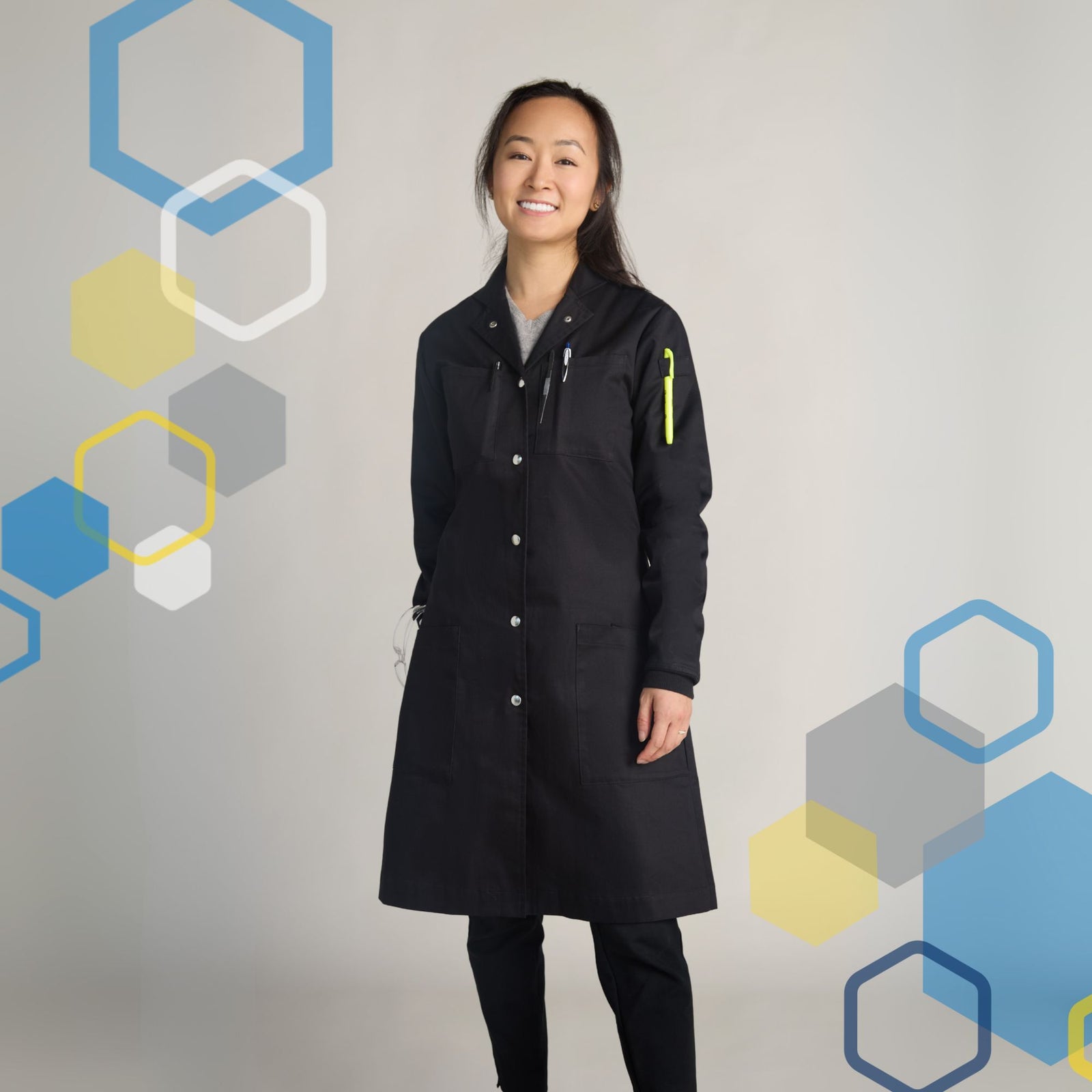 Rosalind lab coat sleeve cuff detail showing navy blue flame retardant fabric construction