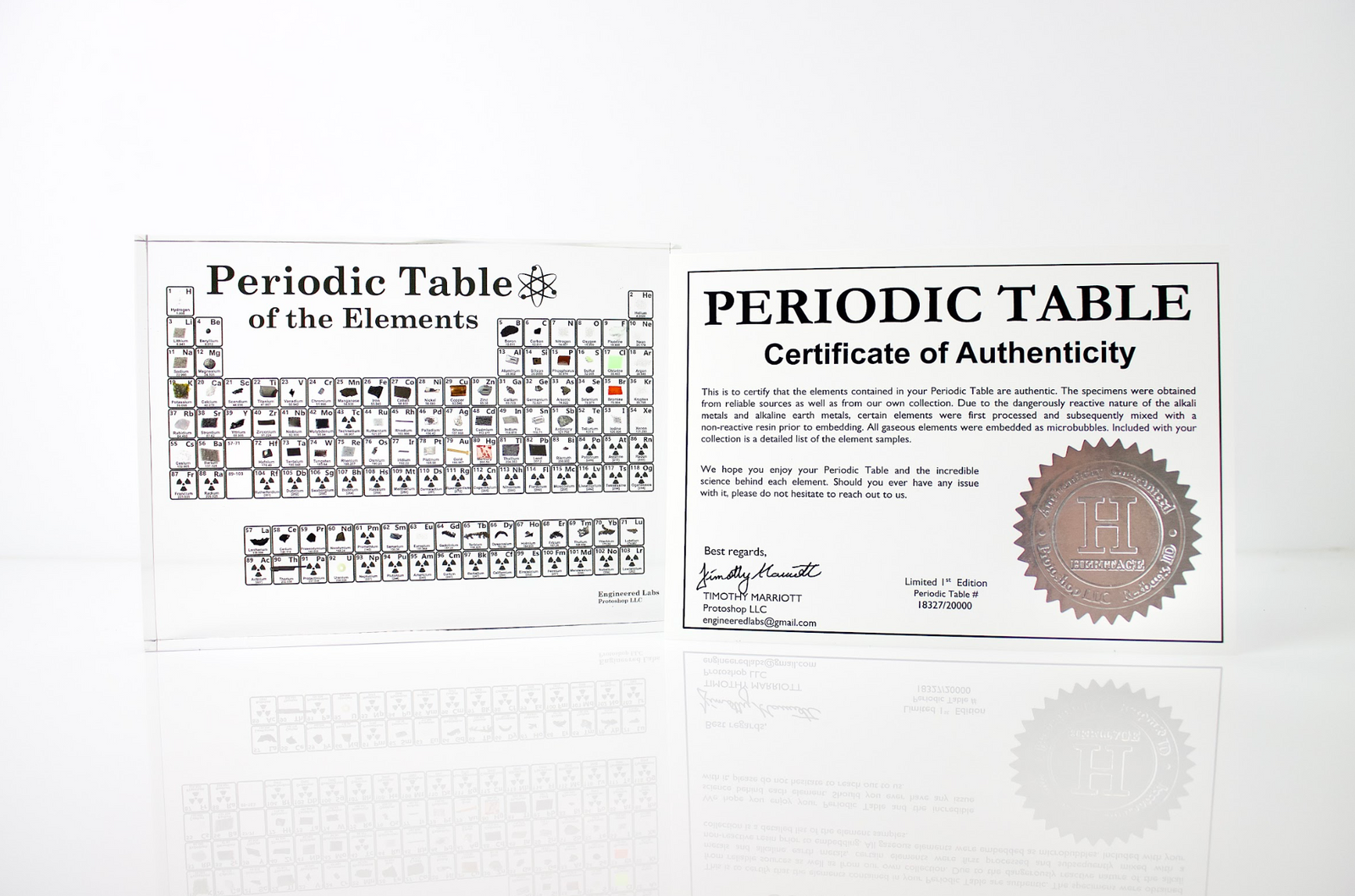 Heritage periodic table display on desk showing all 83 real embedded elements, collector gift