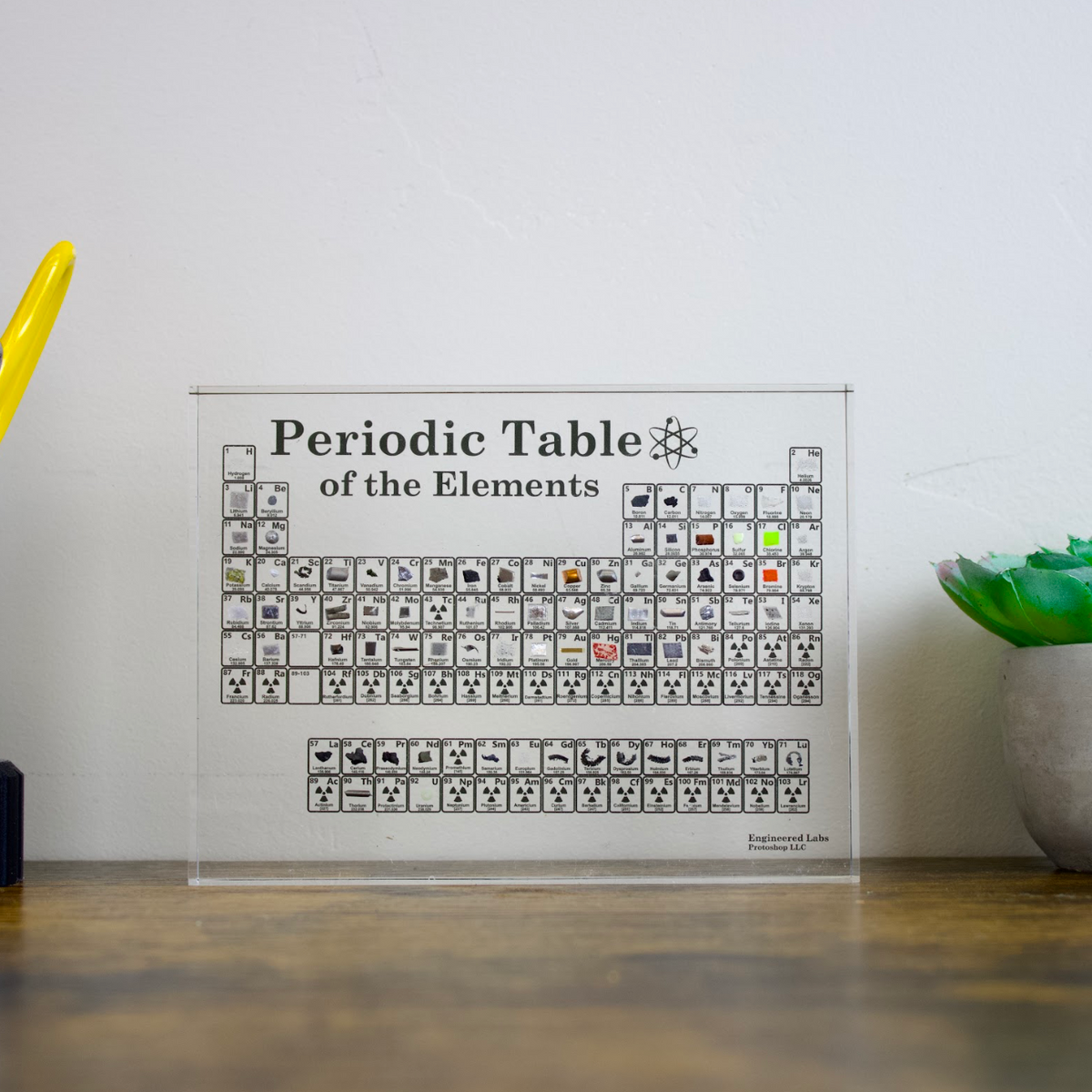 Heritage element embedment display showing rare and common elements in acrylic, collector gift