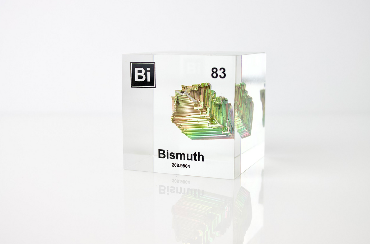 Bismuth element cube facing left on white background, collector gift for science enthusiasts