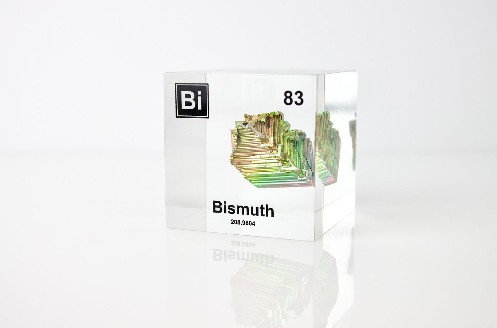 Bismuth element cube facing left on white background, collector gift for science enthusiasts