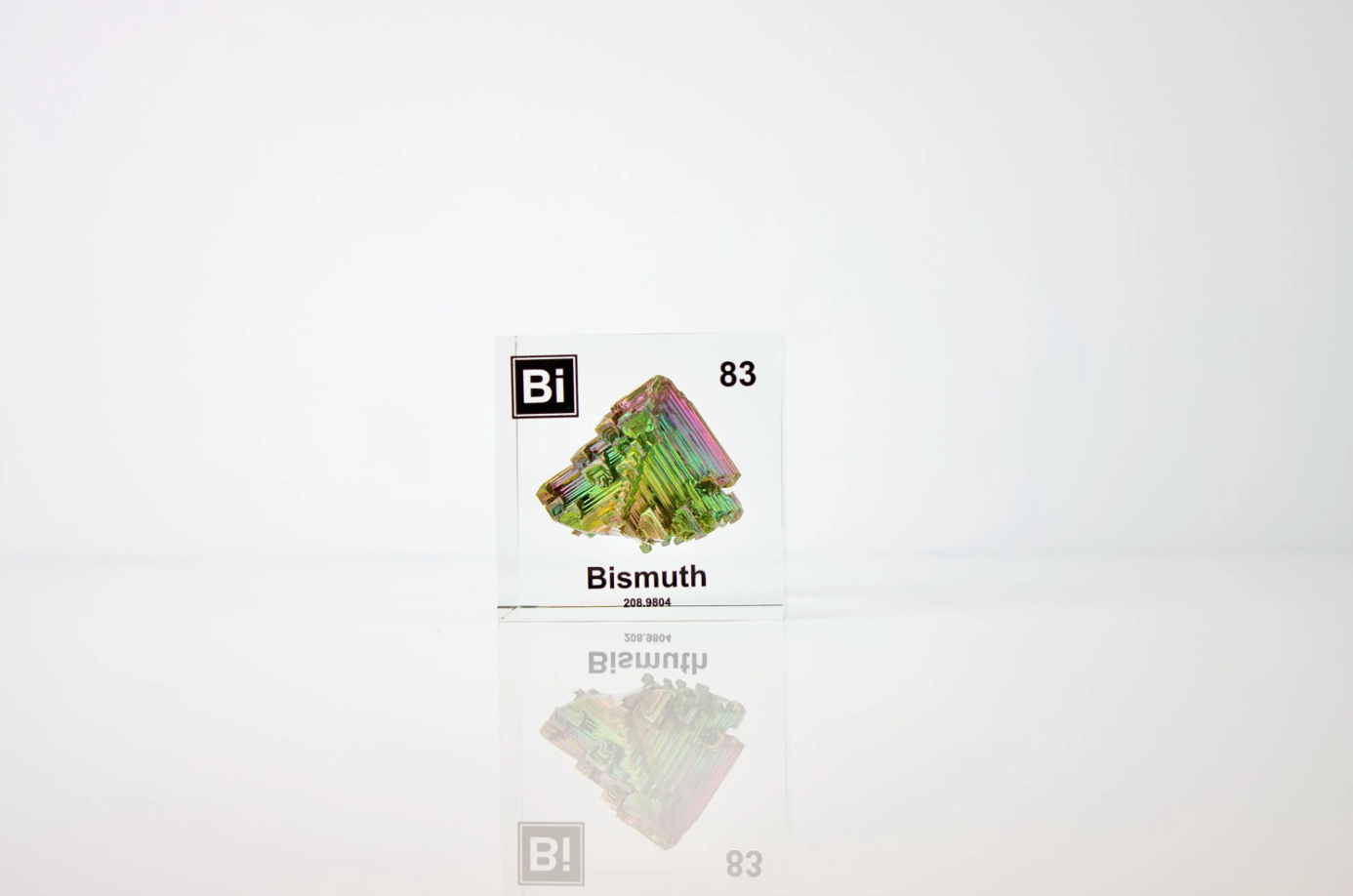 Bismuth element cube front view on white background, collector gift for periodic table fans