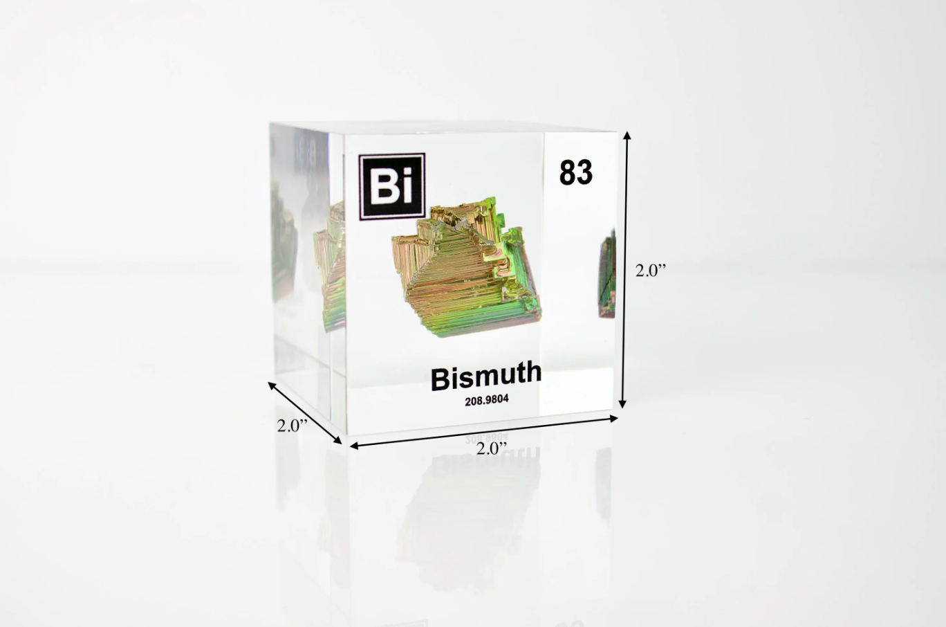 Bismuth element cube with dimension measurements on white background, collector gift