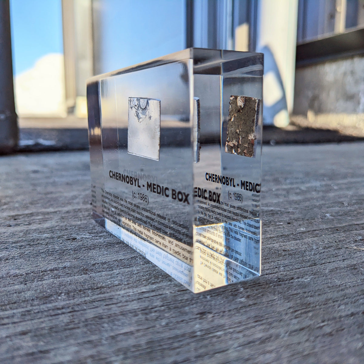Chernobyl Medic Box acrylic display against window background, nuclear history collectible, collector gift