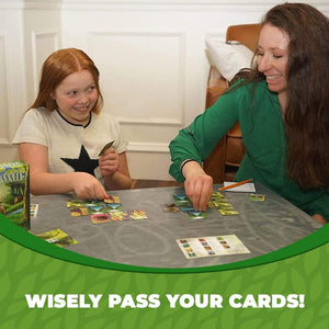 Ecosystem card game player hands and scored animal cards on table, educational gift