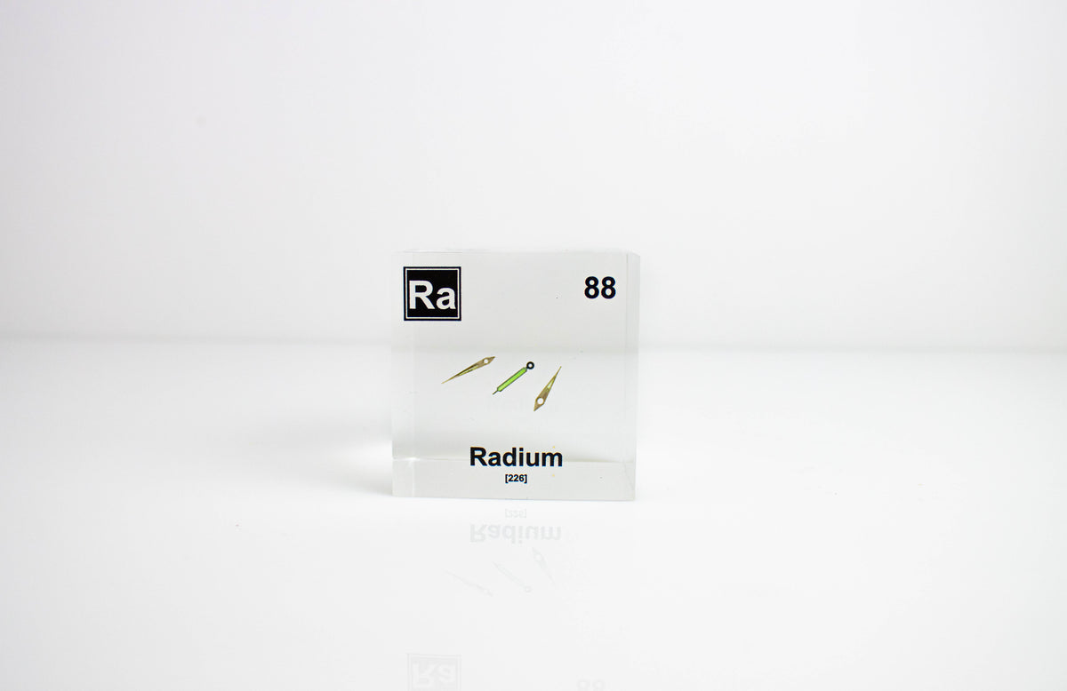 Radium element cube held in hand showing scale, rare nuclear collector gift for science fans