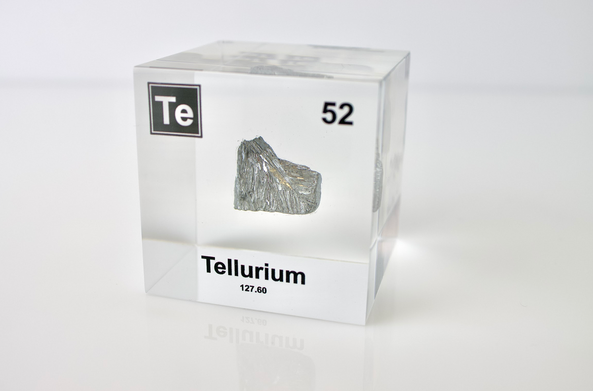 Tellurium element cube top view showing silvery metallic surface, collector gift for science fans