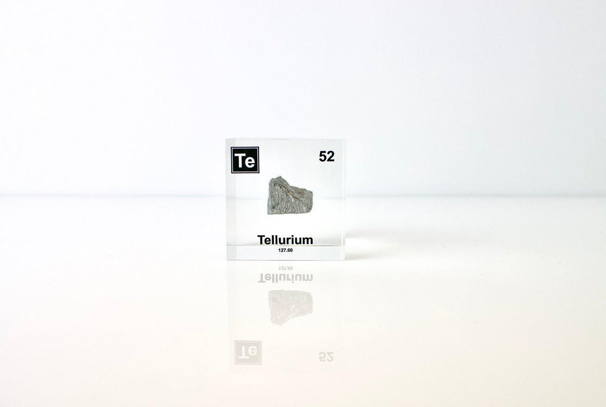 Tellurium element cube angled view showing silvery metallic surface texture, collector gift