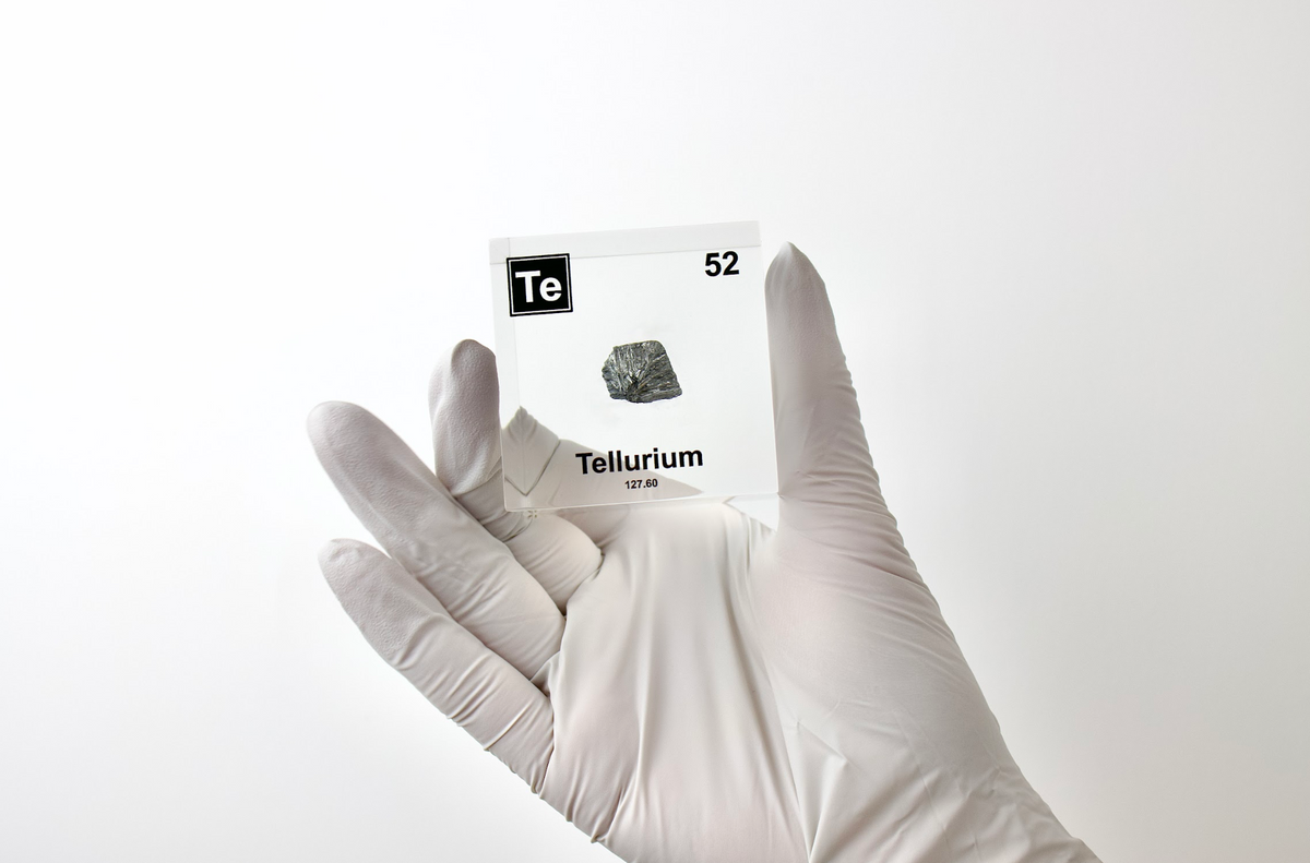 Tellurium element cube displayed in a laboratory setting, unique collector gift for scientists
