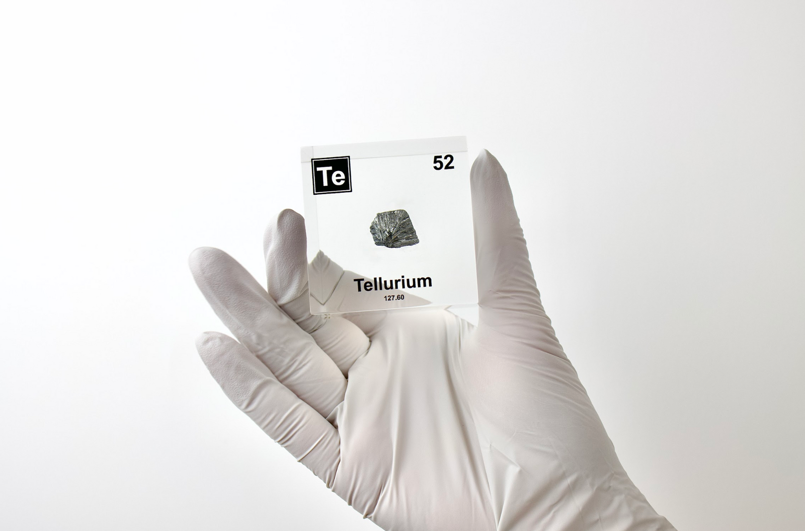 Tellurium element cube displayed in a laboratory setting, unique collector gift for scientists