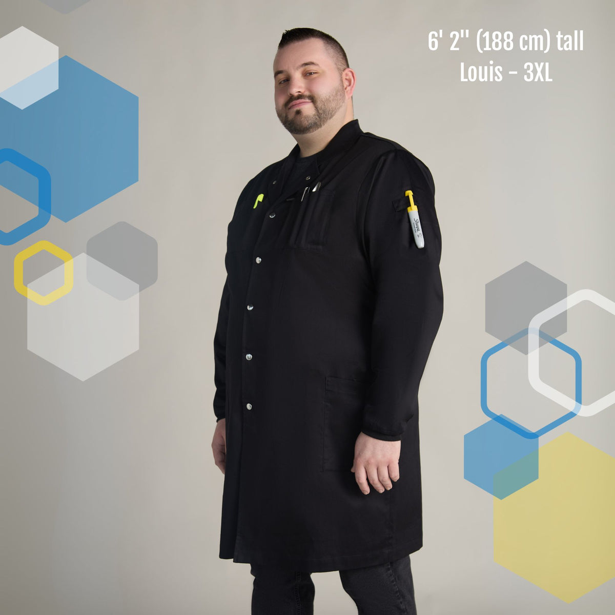 tall and broad male scientist wearing men's triple xl (3XL) black 100% cotton lab coat for engineering lab work with markers in his pockets