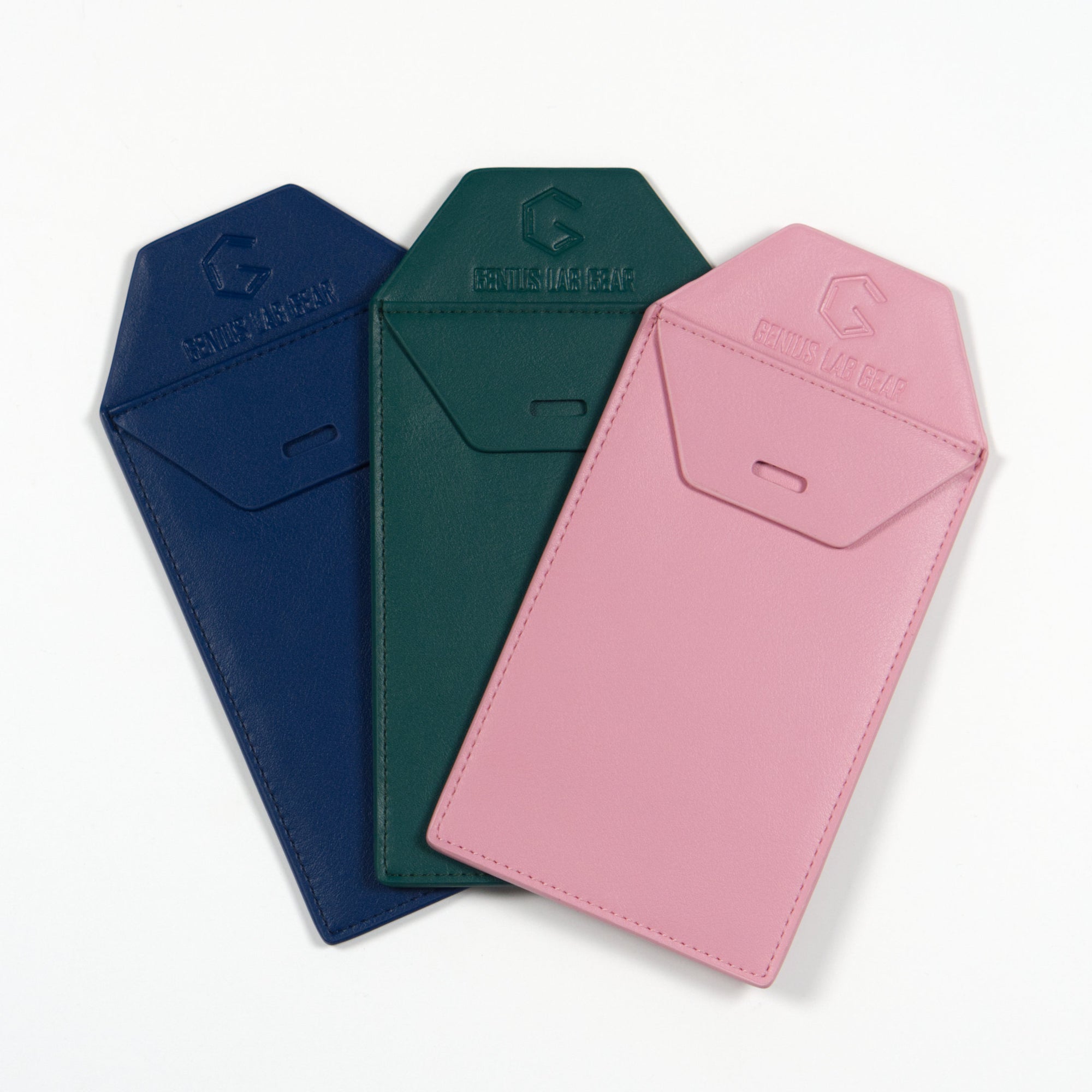 blue, green, and pink leather pocket protectors for scientists wearing lab coats