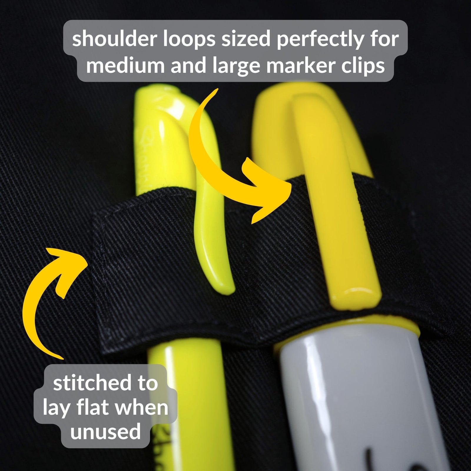 the marie curie and louis black cotton lab coat for scientists showing close-up of double marker loops on shoulder for easy access during research experiments