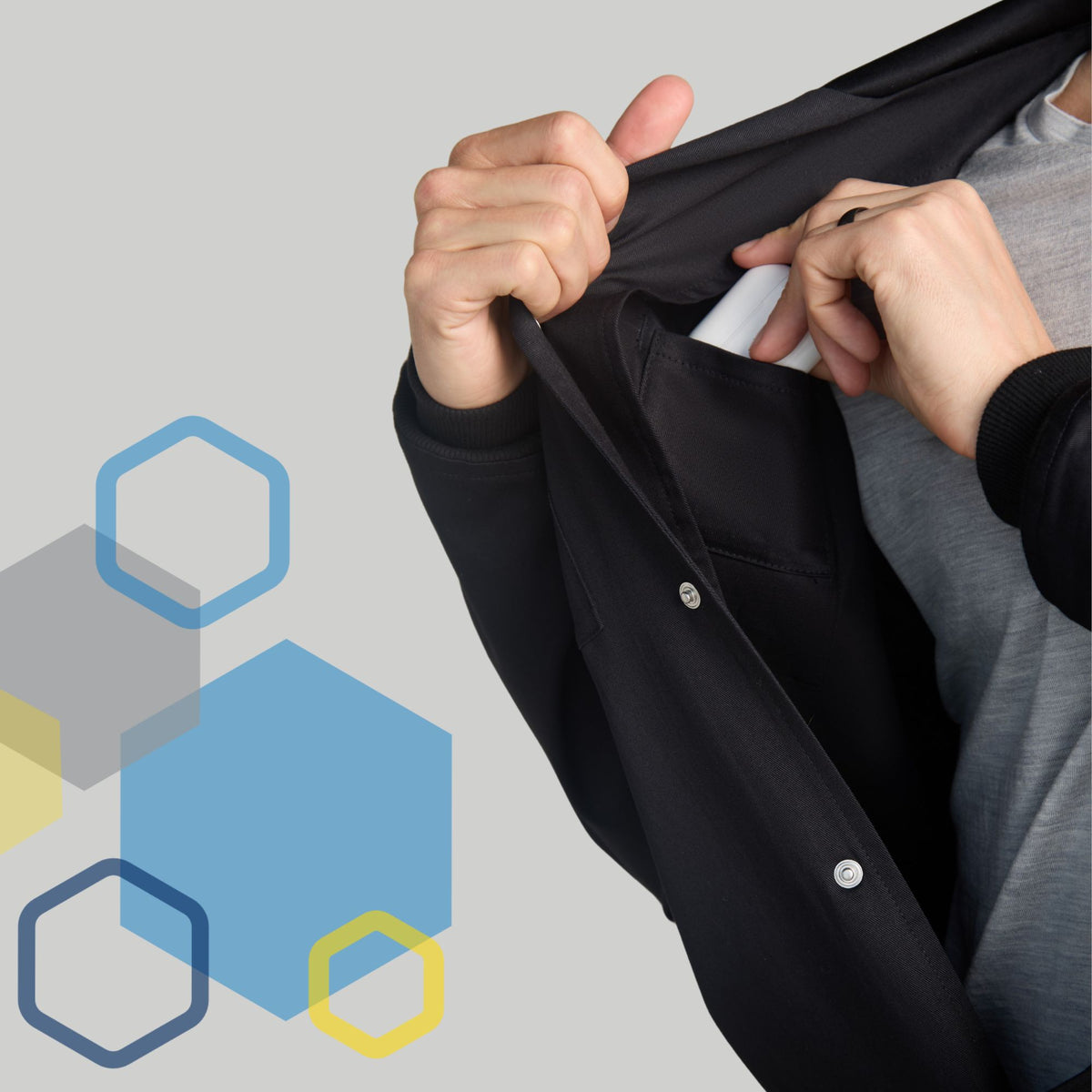 male scientist opening lab coat to store airpods in hidden pocket inside the lab coat during lab work