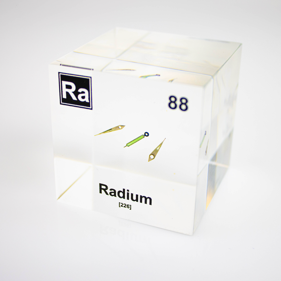 Radium element cube in display case square product view, rare radioactive element collector gift