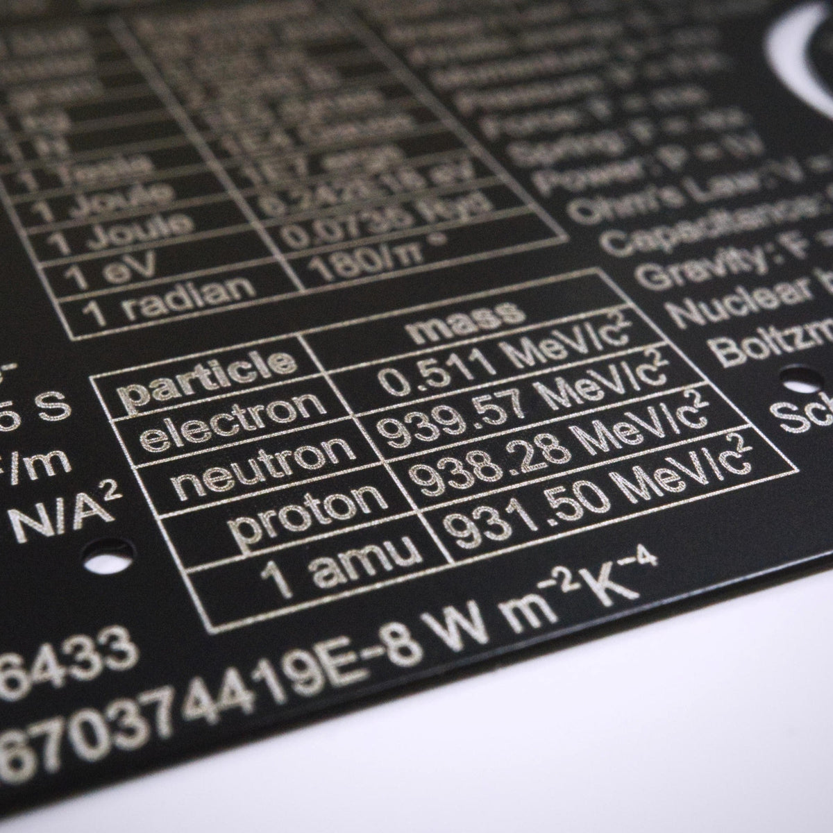 Genius Lab Gear's Pocket Physicist with subatomic particle mass reference table